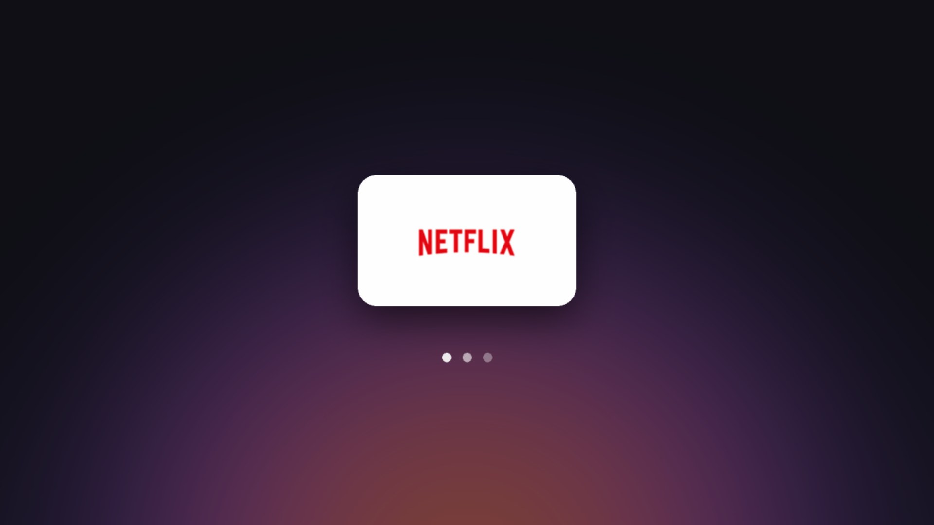 Netflix loading screen: its tile over a soft sunrise glow, with three dots